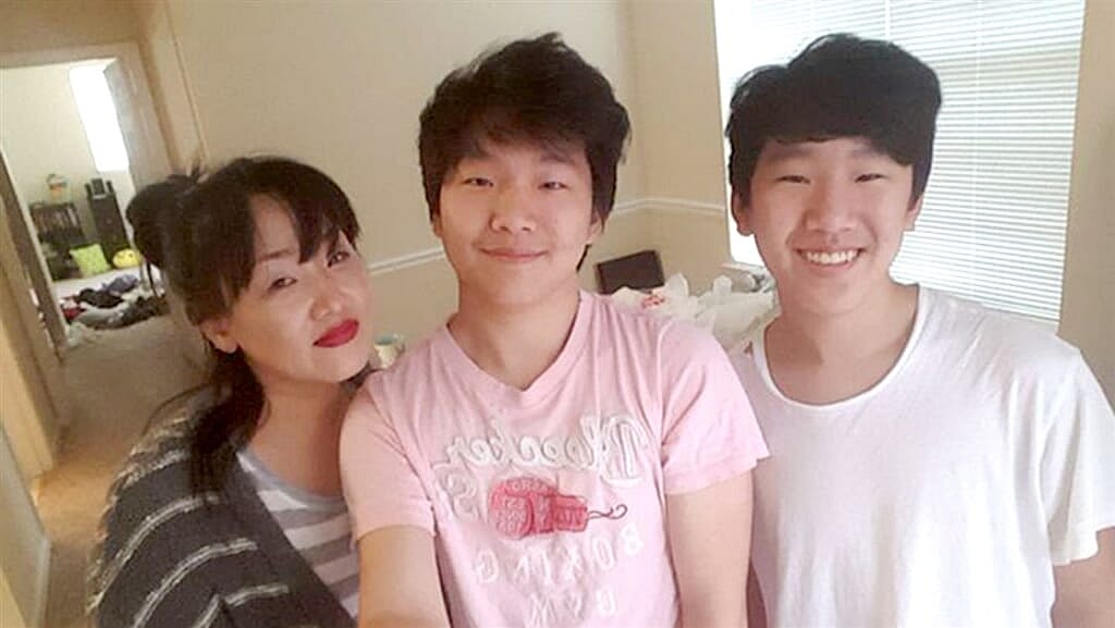 Hyun Jung Grant and her two sons