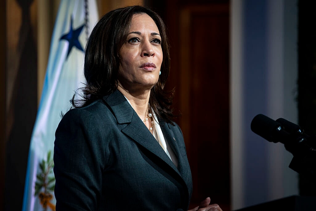 Vice President Kamala Harris wearing a dark teal jacket