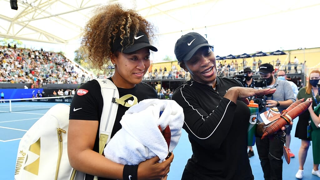 Tennis players Naomi Osaka and Serena Williams