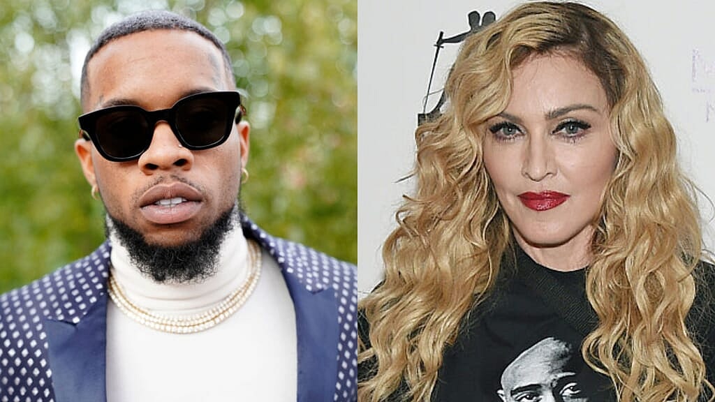 Canadian musician Tory Lanez wearing a blue jacket with white polka dots; singer Madonna wearing a black Tupac shirt