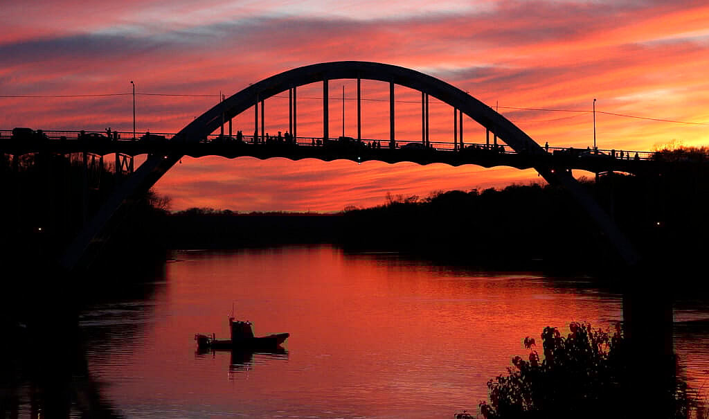 The sun sets over the Edmund Pettus Bridge in Selma, Ala.