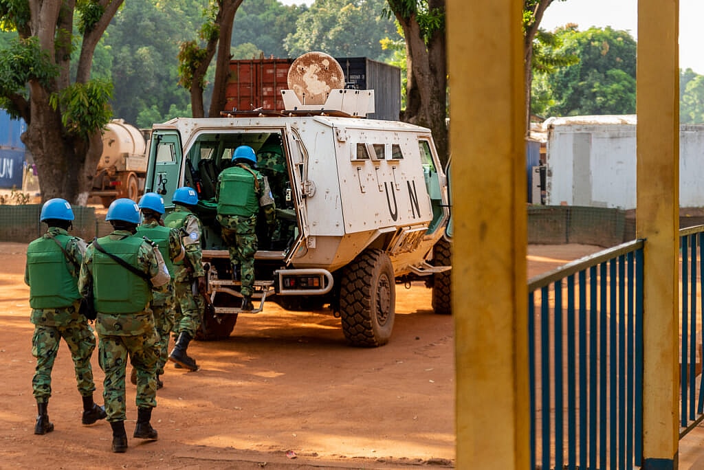Cameroonian United Nations peacekeepers get into an armored personnel carrier