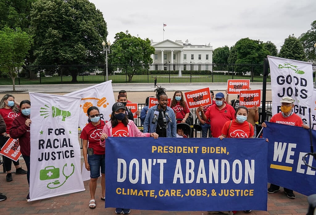 Activist Maurice Mitchell speaks to those attending a demonstration by various activists