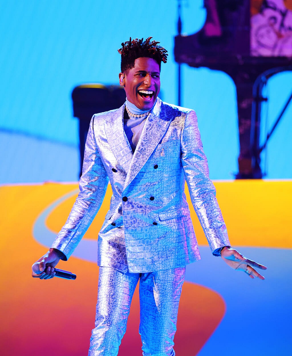 Jon Batiste performs at the 64th Annual GRAMMY Awards - theGrio.com