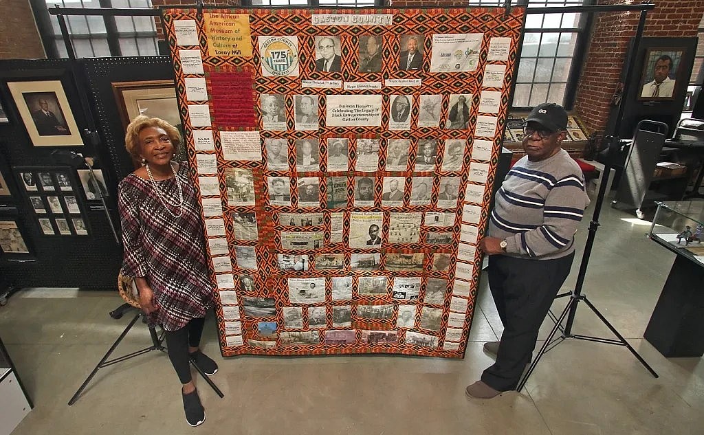 Dot Guthrie and Charles Whitesides with the Gaston County Business Pioneers Quilt in Gastonia, North Carolina