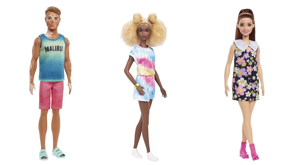Ken doll with vitiligo, Black Barbie with Afro-puffs and Barbie with a hearing aid