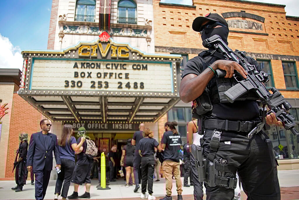 People wait to get into the Akron Civic Center for a public viewing for Jayland Walker