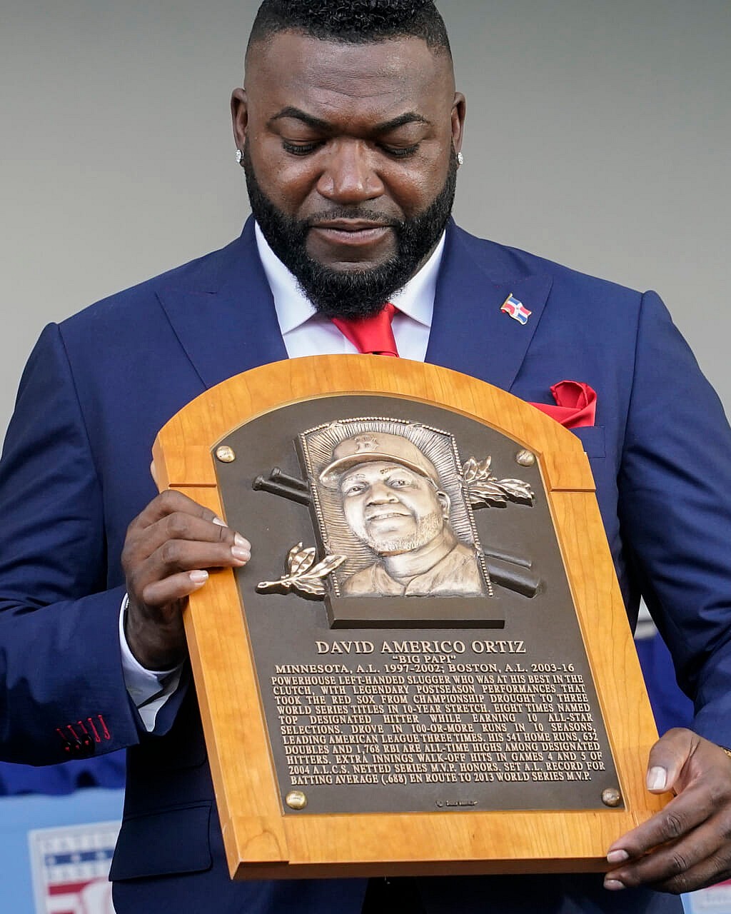 Hall of Famer David Ortiz, formerly of the Boston Red Sox, holds his plaque