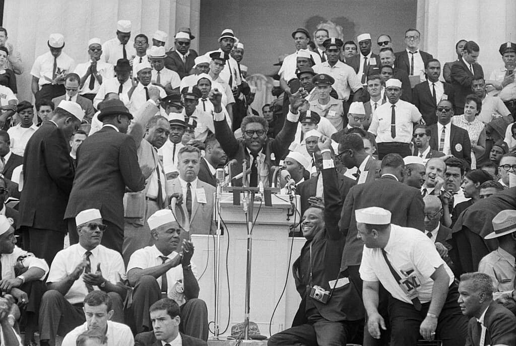 Bayard Rustin, deputy director of the March on Washington, speaks to the crowd of marchers