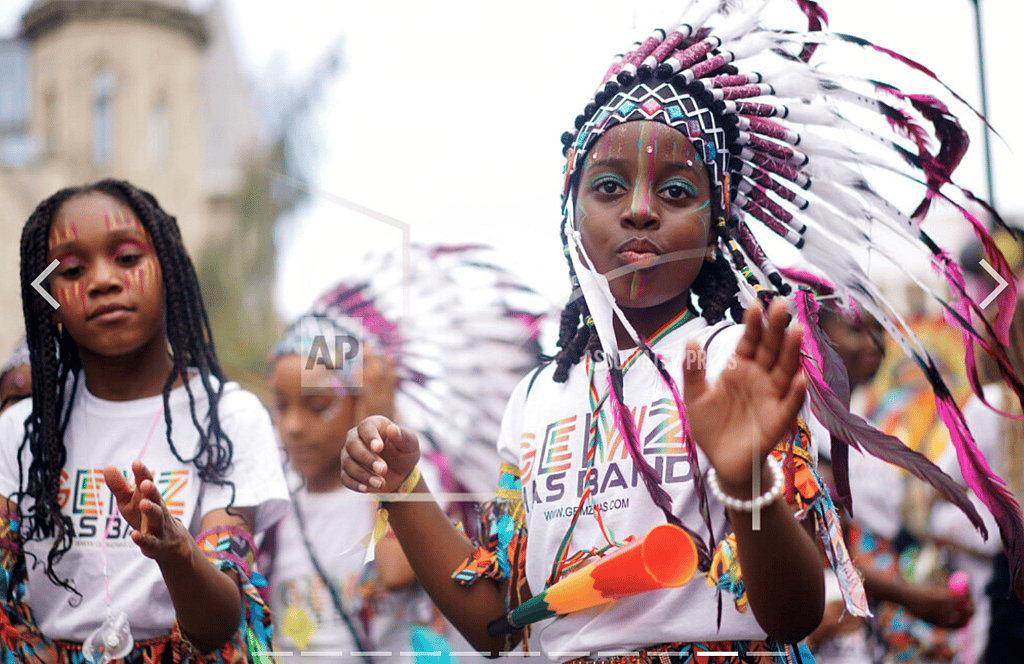 Young carnival-goers gather at the Notting Hill Carnival