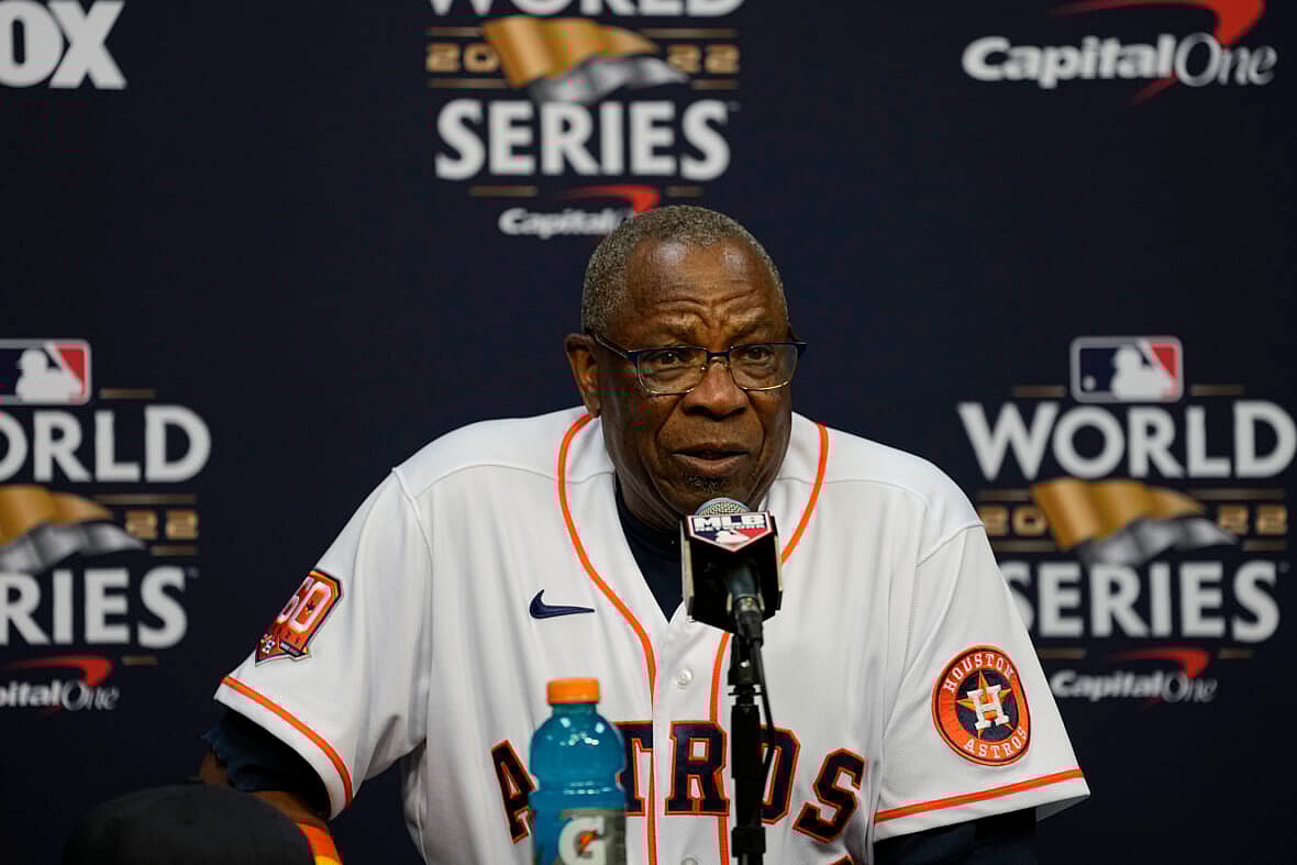 Houston Astros manager Dusty Baker Jr. at a podium in uniform