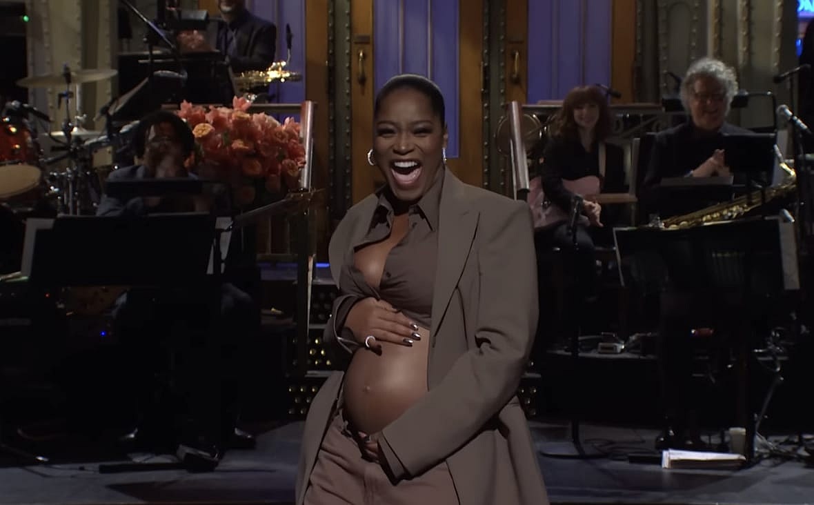 Actor Keke Palmer reveals her baby bump during her “Saturday Night Live” hosting debut