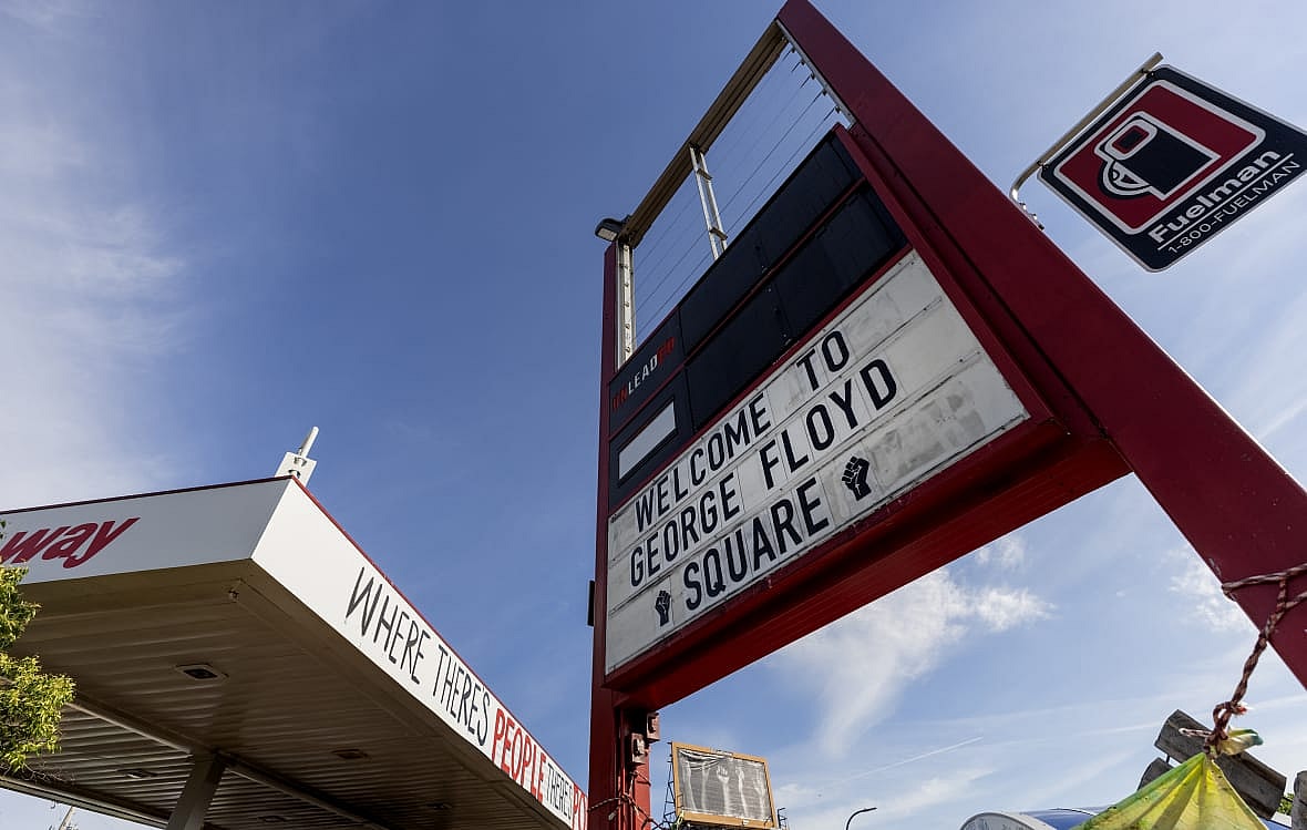 A sign at the Speedway gas station greets visitors at George Floyd Square