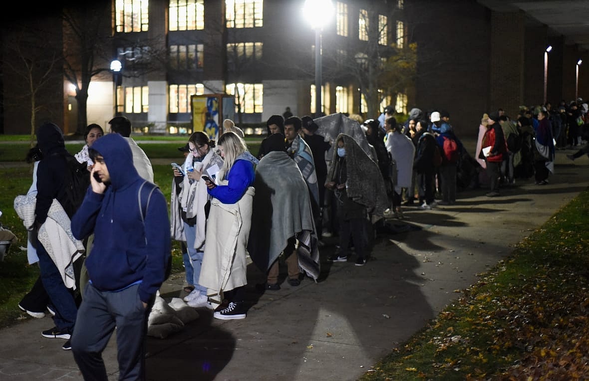 Hundreds of University of Michigan students wait in line to register to vote