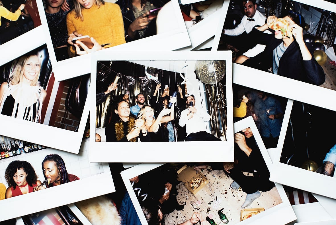 Various photos spread out on a surface