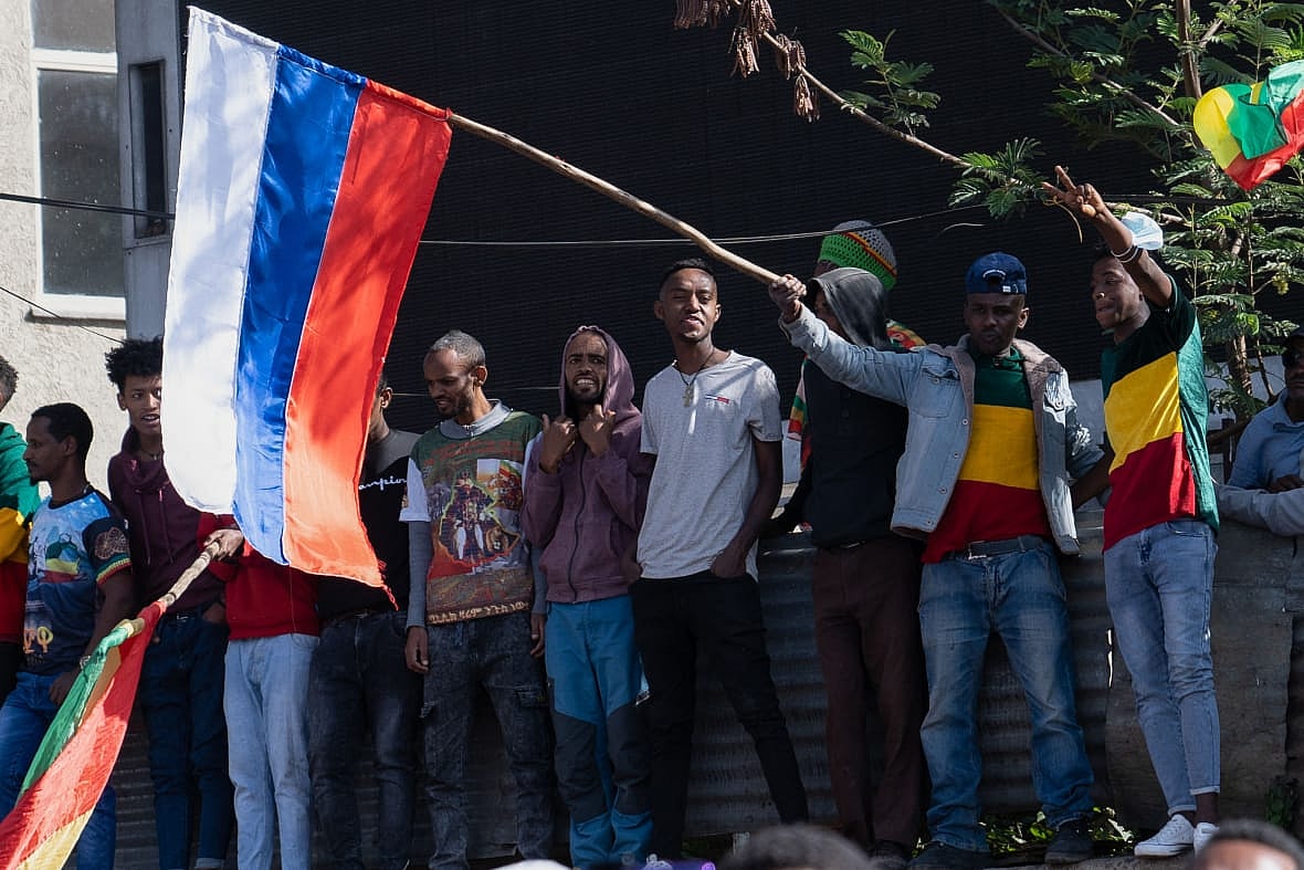 A man waves a Russian flag during the celebration of the 126th victory of Adwa in Ethiopia