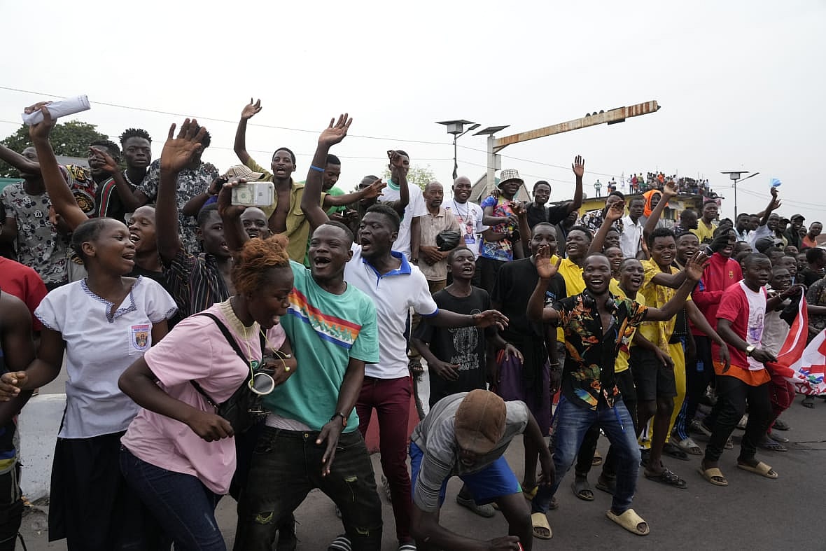 People cheer for Pope Francis