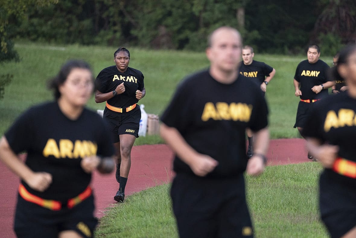 Students in the new Army prep course run around a track