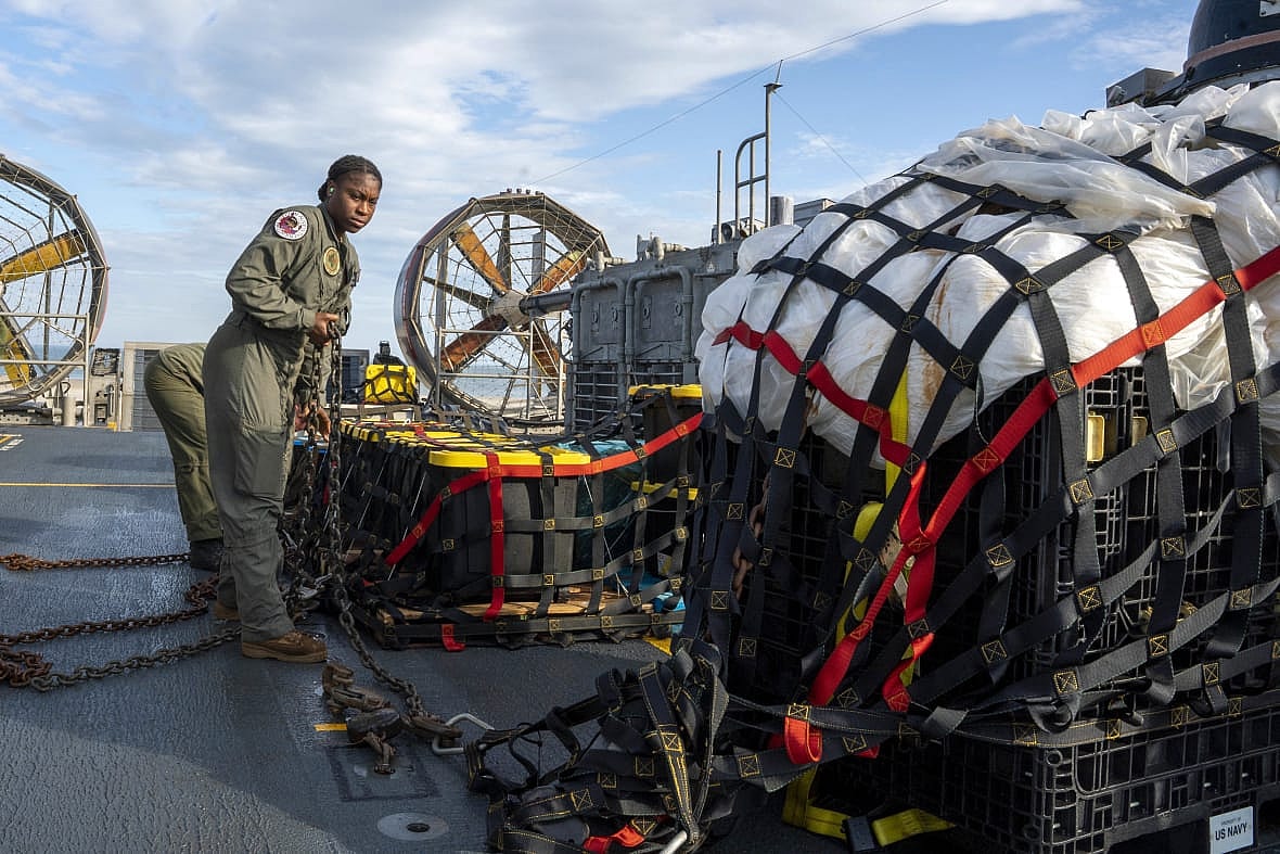 U.S. Navy sailors prepare material recovered off the coast of Myrtle Beach, South Carolina