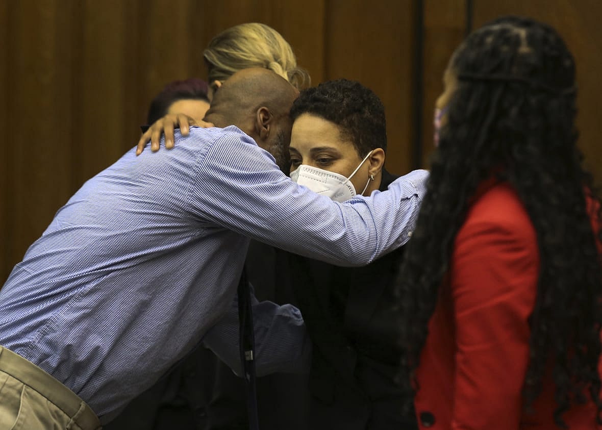Lamar Johnson embraces St. Louis Prosecutor Kim Garner