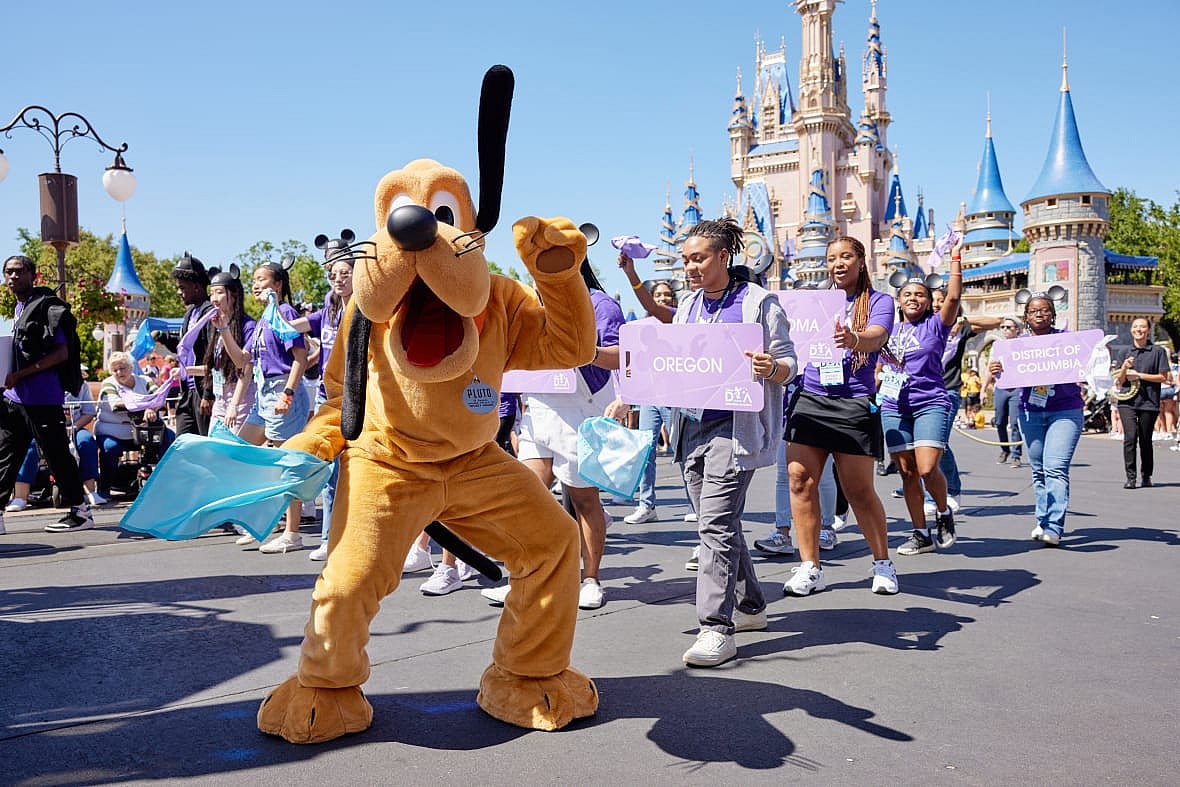 Disney Dreamer Academy students march down Main Street U.S.A.