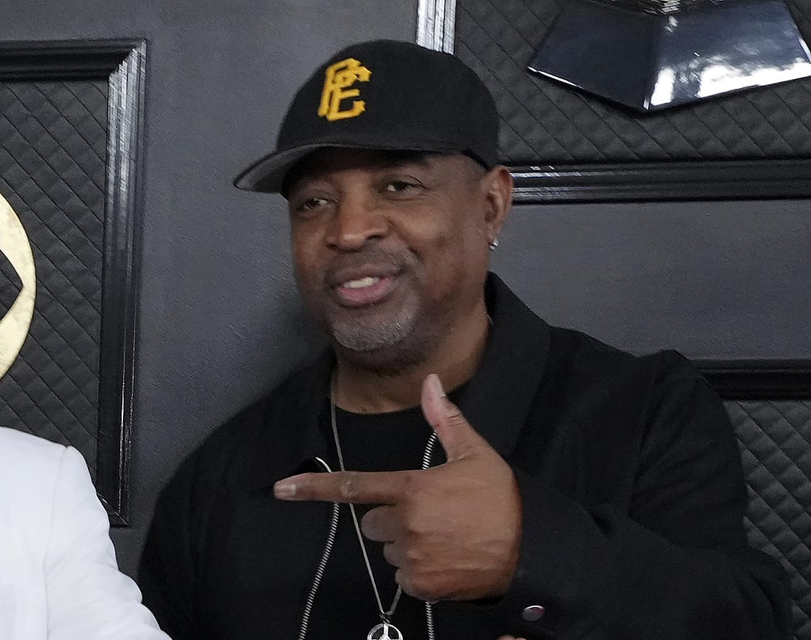 Rapper Chuck D of Public Enemy, wearing a black baseball cap and jacket