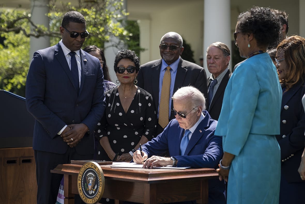 President Joe Biden signs an executive order