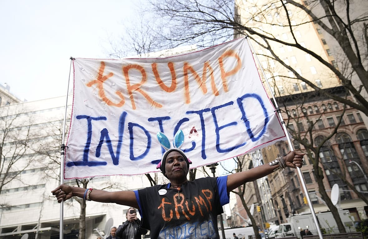 A protester holds a sign