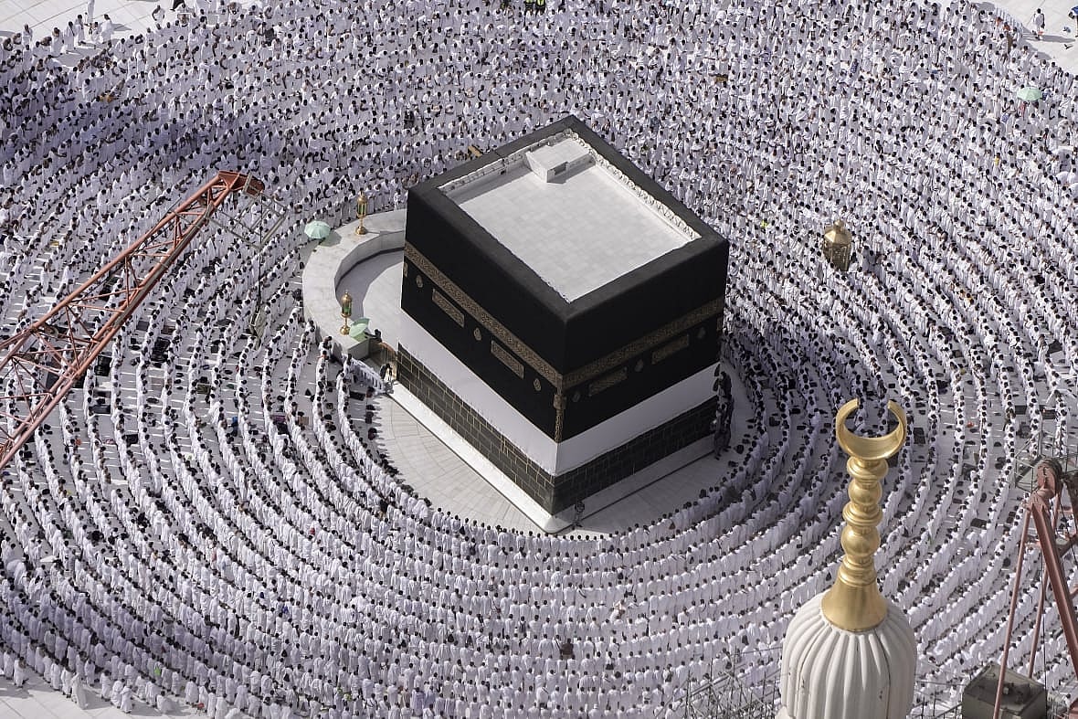 Muslim pilgrims pray around the Kaaba