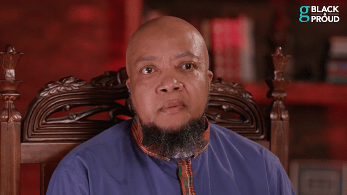 LGBTQ+ activist Yunus Coldman in a purple shirt