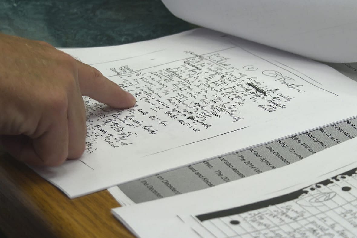 Attorney Pat Simasko points at a copy of one of Aretha Franklin’s handwritten wills