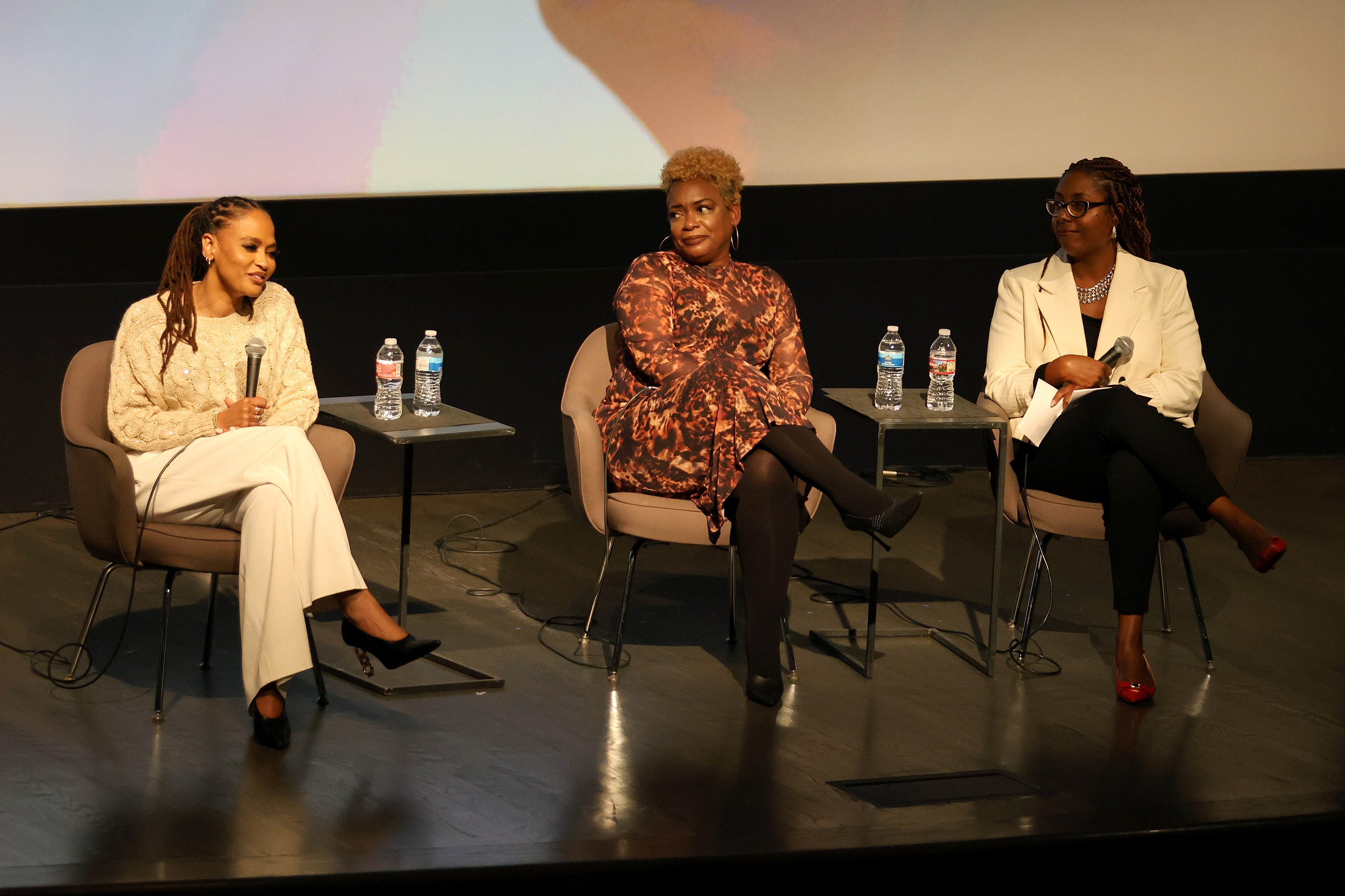 Director Ava DuVernay with actor Aunjanue Ellis-Taylor and Dr. Kenya Davis