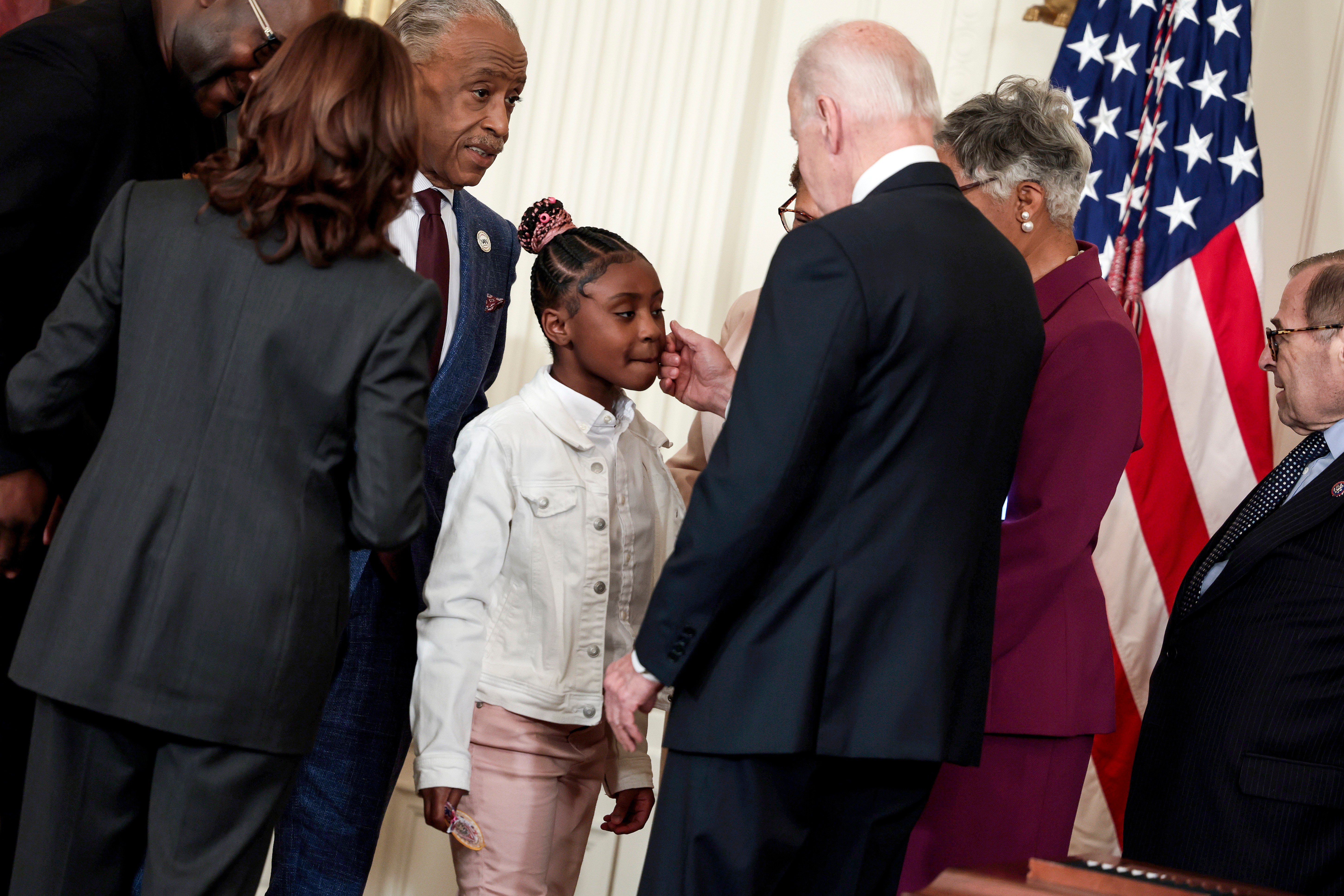 Vice President Kamala Harris, the Rev. Al Sharpton, Gianna Floyd, the daughter of George Floyd, and President Joe Biden