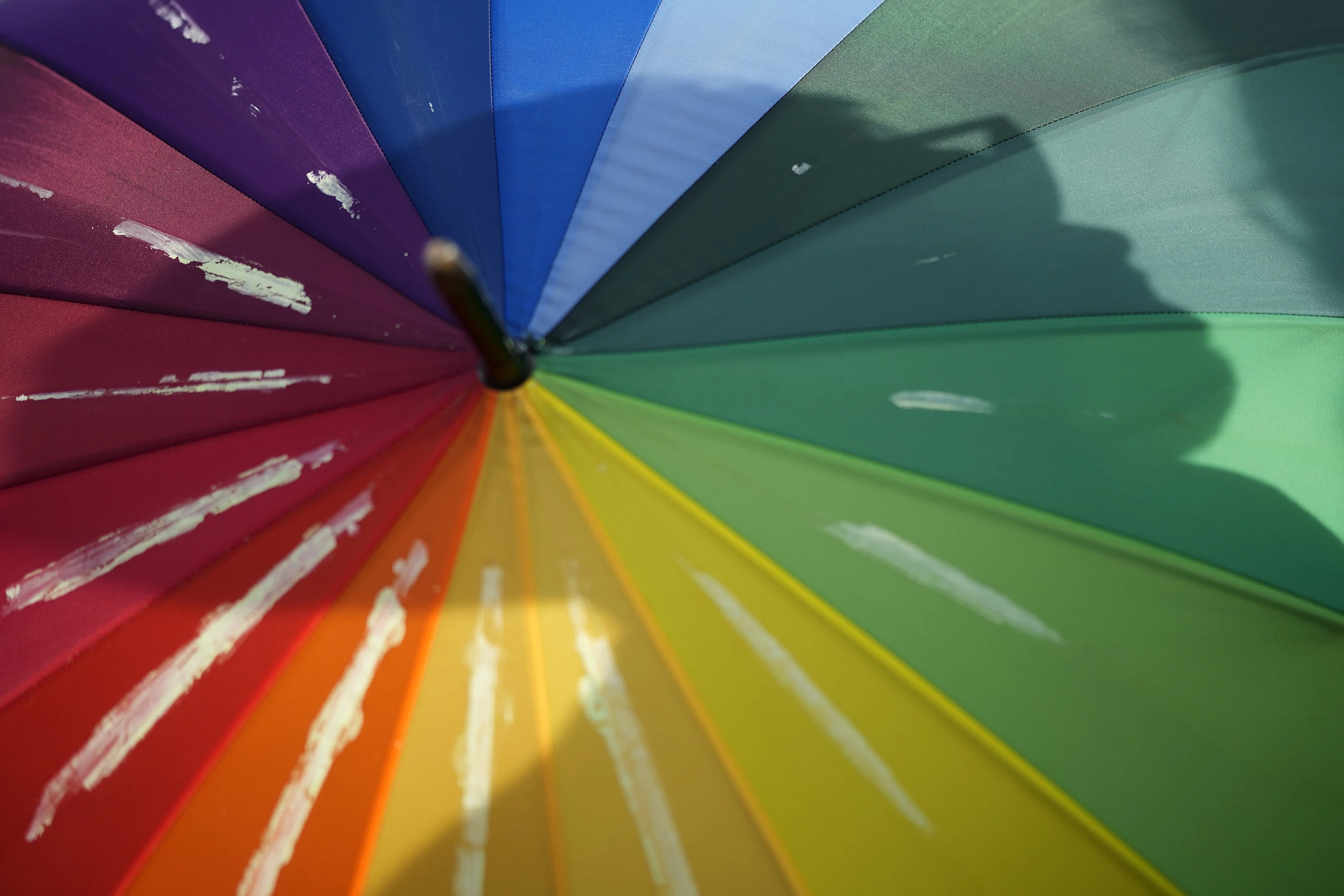A rainbow-colored umbrella