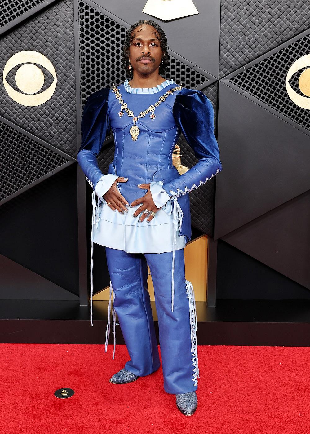 Duckwrth attends the 68th Grammy Awards in a blue leather renaissance suit