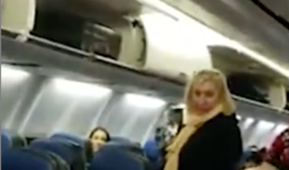 White woman escorted off of airplane after harassing Black couple thegrio.com
