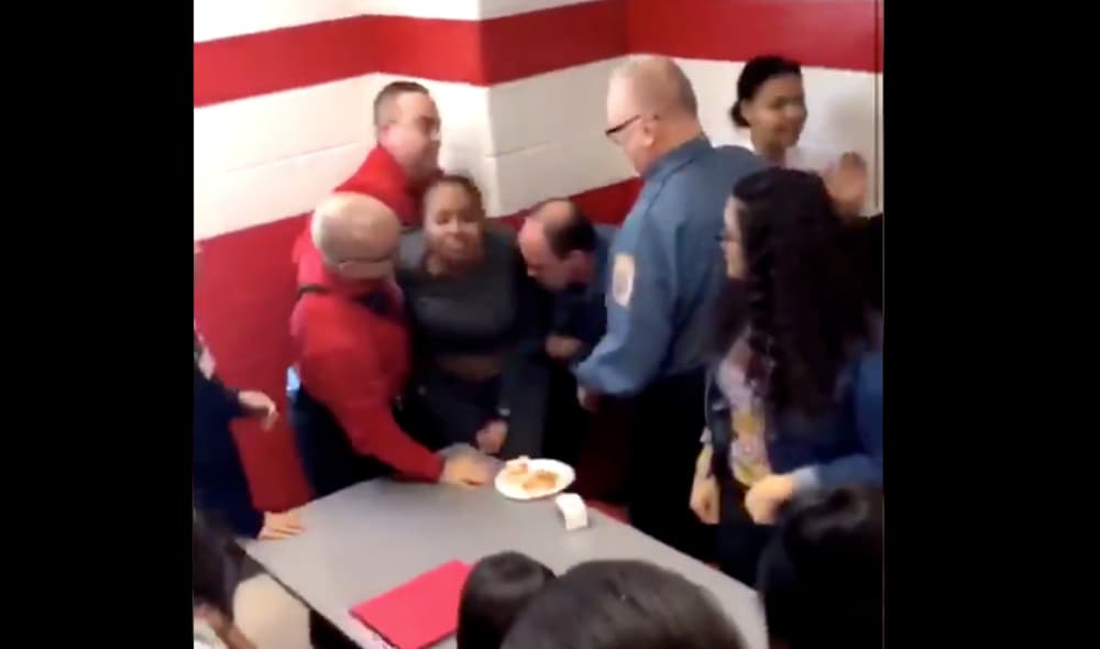 Video of a Black female Hazeltown Area High School student being brutally restrained by four security officers has gone viral. (Twitter)