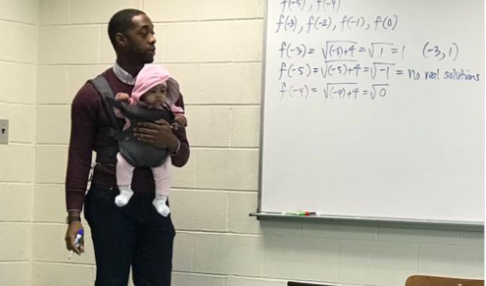 Morehouse professor goes viral for carrying student's child so he could take notes during lecture. thegrio.com