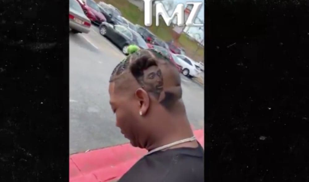 Yung Joc shows off new hair cut featuring Tupac. (TMZ) thegrio.com