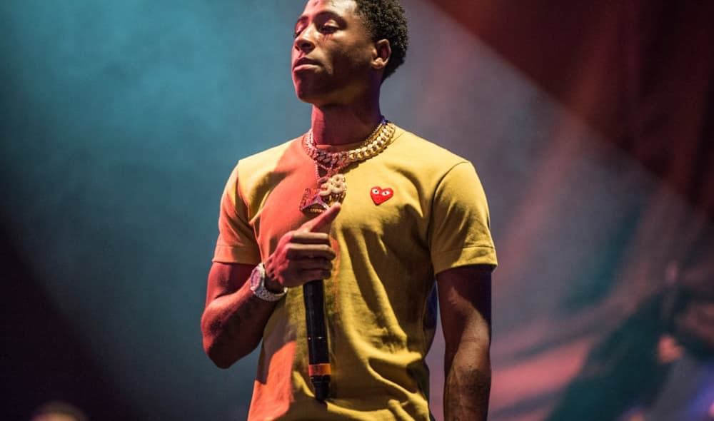 NBA YoungBoy performs at the Lil' WeezyAna Fest at Champions Square on Friday, Aug. 25, 2017, in New Orleans. (Photo by Amy Harris/Invision/AP) thegrio.com
