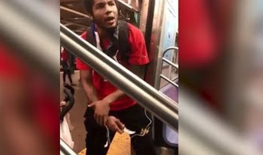 man slaps toddler on subway train