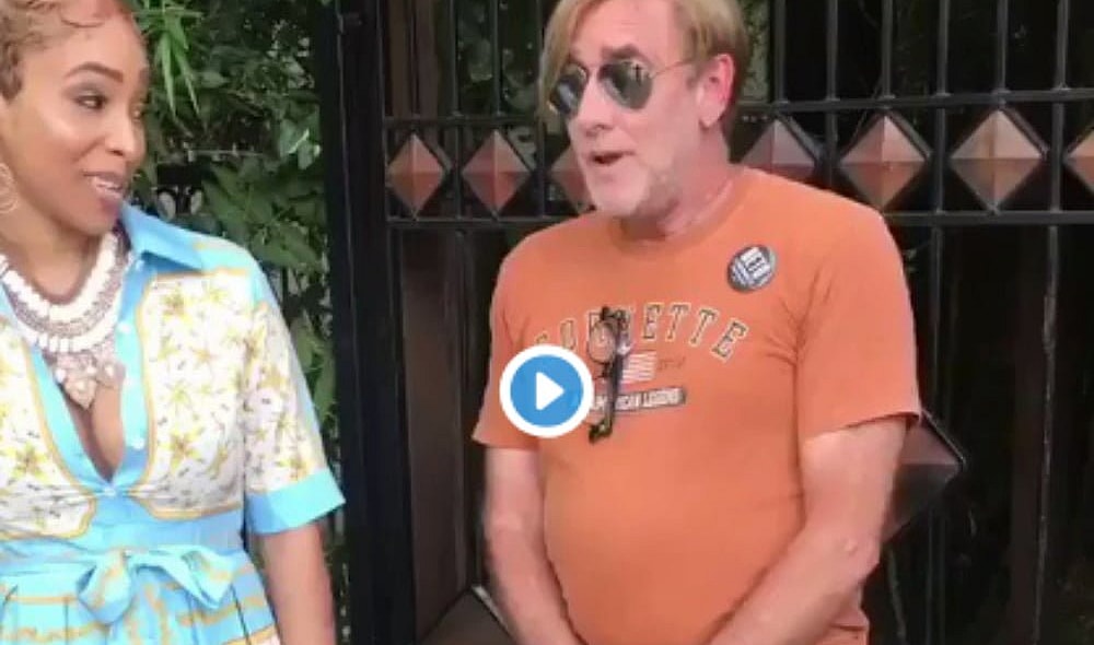 White man interupts Black woman's photo shoot thegrio.com