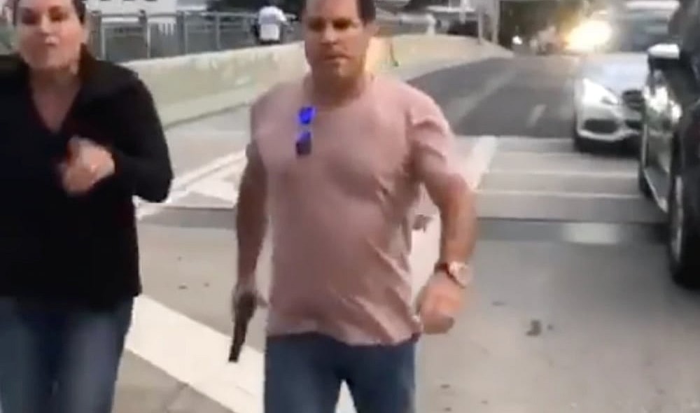 Miami prosecutor exploring hate crime charges against Mark Bartlett for MLK rally incident. thegrio.com