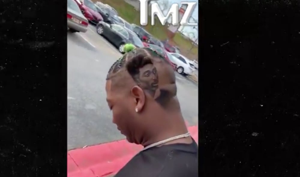 Yung Joc shows off new hair cut featuring Tupac. (TMZ) thegrio.com