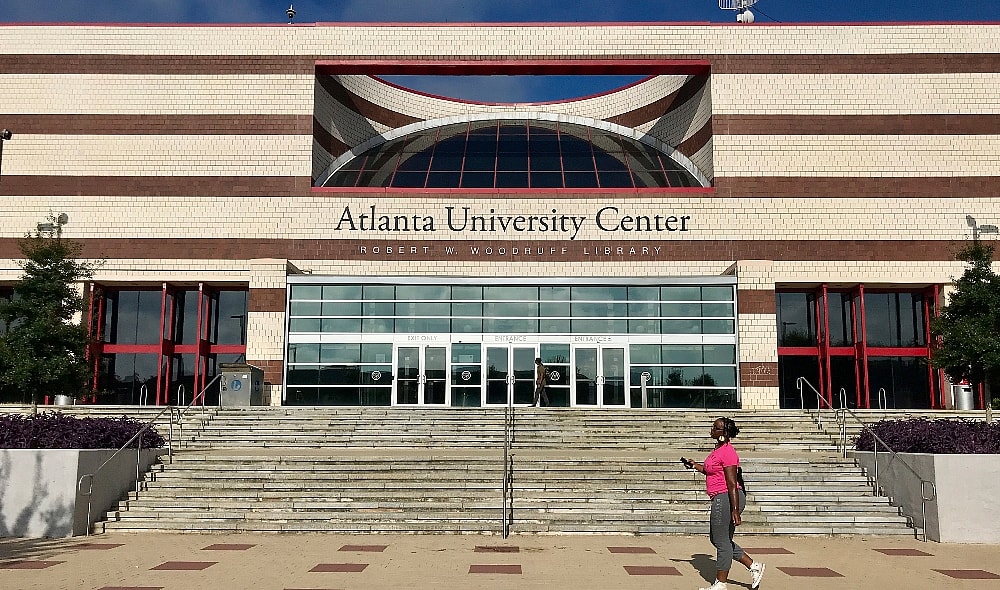 The campus of Clark Atlanta University is seen Wednesday, April 21, 2019, in Atlanta. Four college students were wounded when a gunman opened fire into a crowd of 200 people outside a library near the university, Tuesday night, and then escaped in the chaos, authorities said. (AP Photo/Jeff Martin) thegrio.com