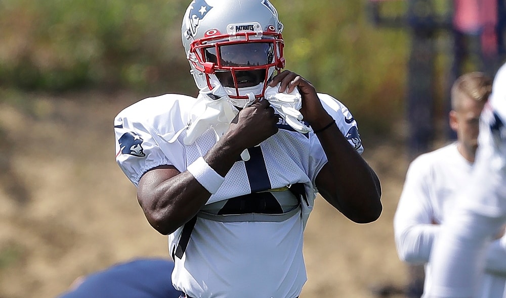 New England Patriots wide receiver Antonio Brown adjusts his gloves while working out during an NFL football practice, Wednesday, Sept. 11, 2019, in Foxborough, Mass. Brown practiced with the team for the first time on Wednesday afternoon, a day after his former trainer filed a civil lawsuit in the Southern District of Florida accusing him of sexually assaulting her on three occasions. (AP Photo/Steven Senne) thegrio.com