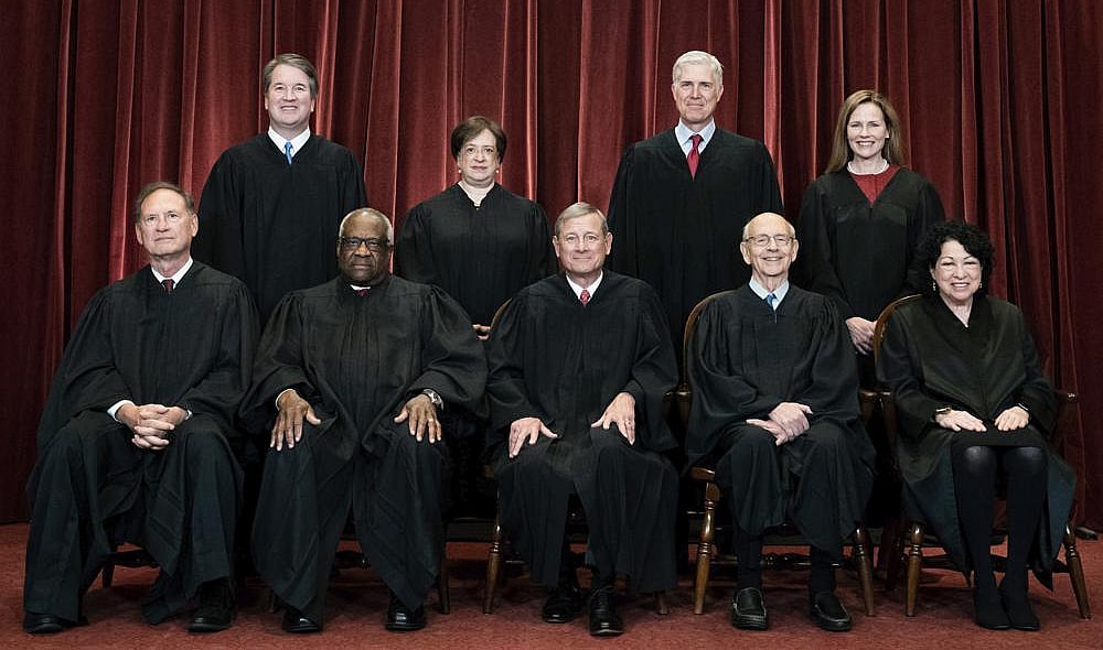 The nine members of the Supreme Court in 2021 in their black judicial robes