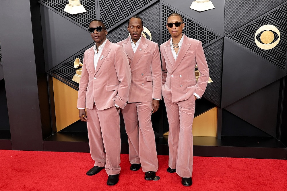 Malice and Pusha T of Clipse and Pharrell Williams attend the 68th Grammy Awards in matching blush colored Louis Vuitton suits