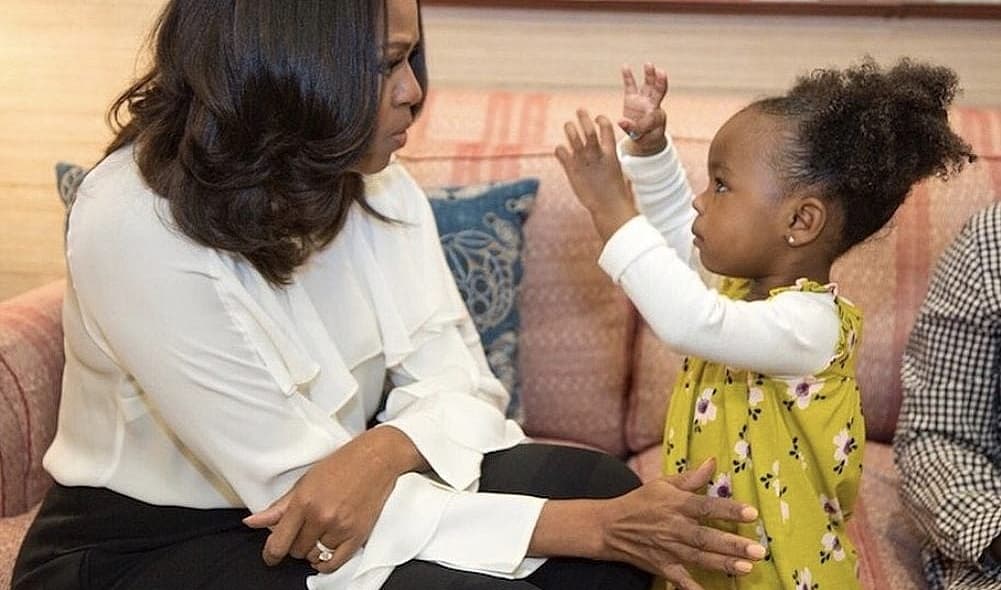 Michelle Obama dances with Parker Curry. thegrio.com