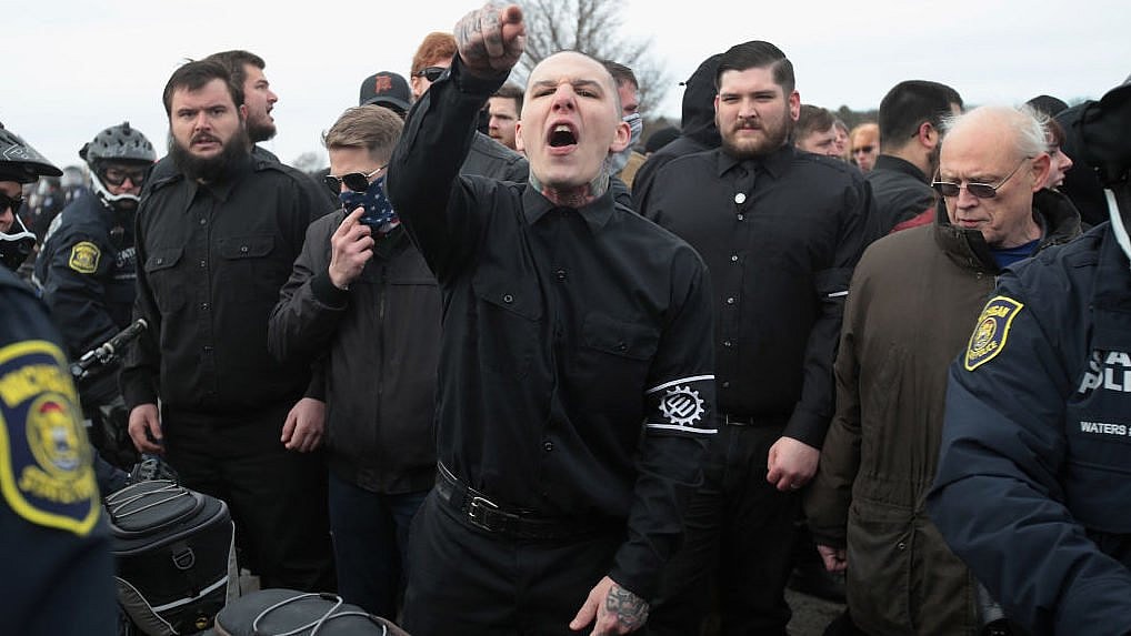 Activists Protest Alt Right Leader Richard Spencer's MSU Appearance EAST LANSING, MI - MARCH 05: White nationalists clash with counter-demonstrators before the start of a speech by white nationalist Richard Spencer, who popularized the term 'alt-right', at Michigan State University on March 5, 2018 in East Lansing, Michigan. Spencer was granted permission to speak after suing the university which is currently on Spring break. (Photo by Scott Olson/Getty Images) thegrio.com